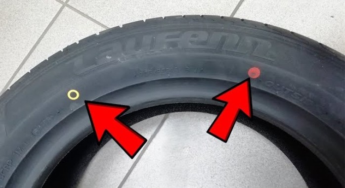Que signifient les points jaunes ou rouges sur vos pneus ?